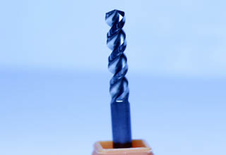 Carbide left-hand spiral drill for stainless steel